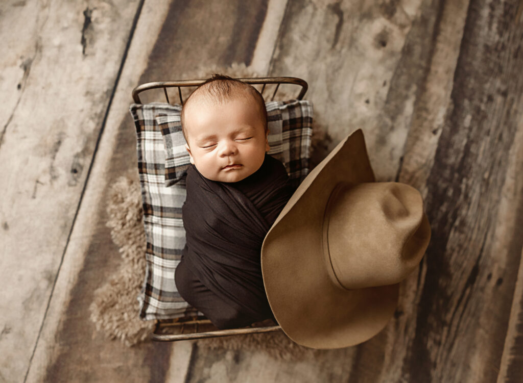 yuba city newborn photographer posing sleeping newborn safely