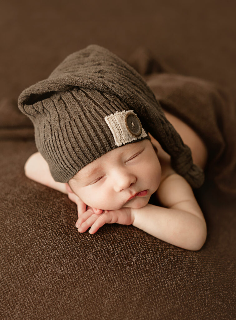 sleeping newborn with sleep had on, elk grove newborn photographer
