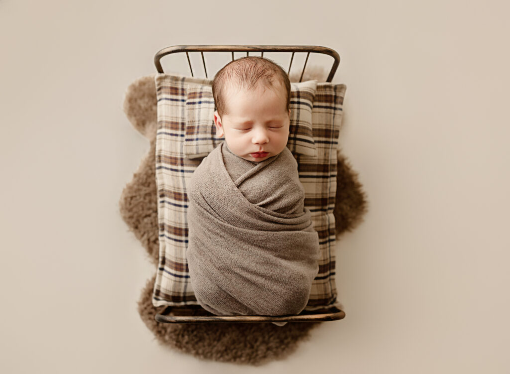 Baby wrapped up sleeping during newborn photo session, elk grove, CA 
